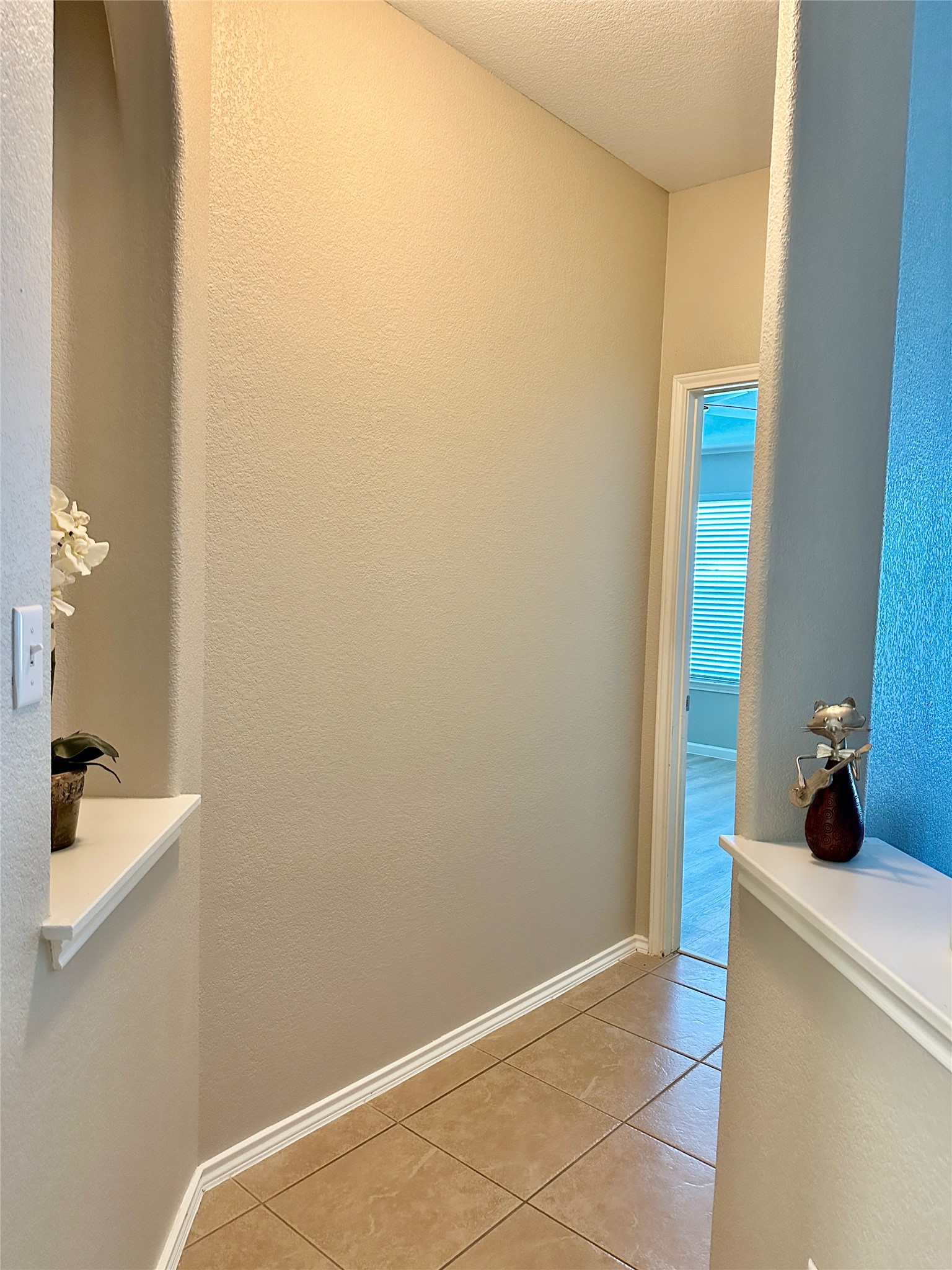 207 Dragon Ridge Road Buda, TX 78610 - Photo 38 of 38 Hallway leads to the main bedroom- mother in law floor plan