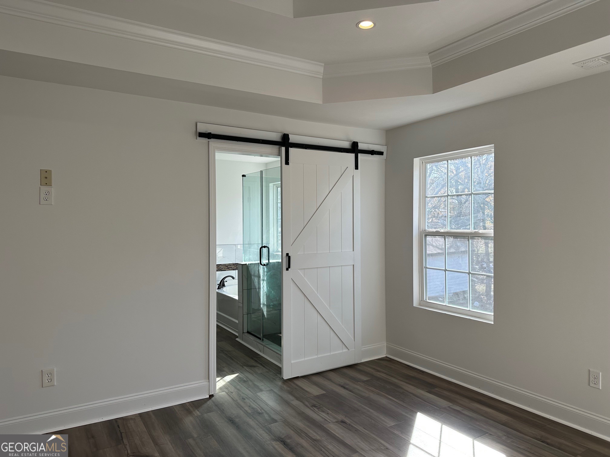 2147 Spring Road Gainesville, GA 30504 - Photo 16 of 44 an empty room with wooden floor cabinet and windows