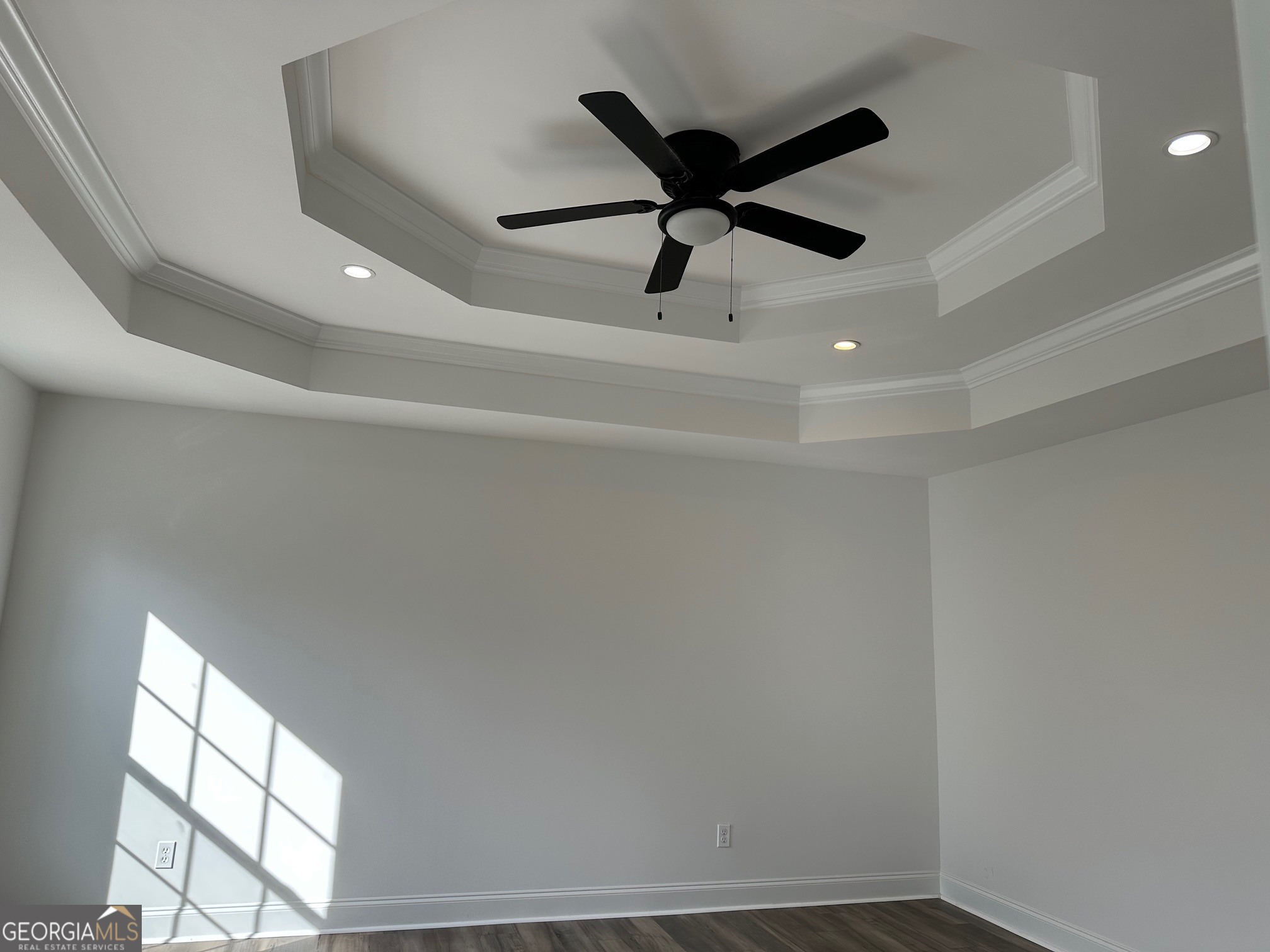 2147 Spring Road Gainesville, GA 30504 - Photo 22 of 44 an empty room with windows and fan