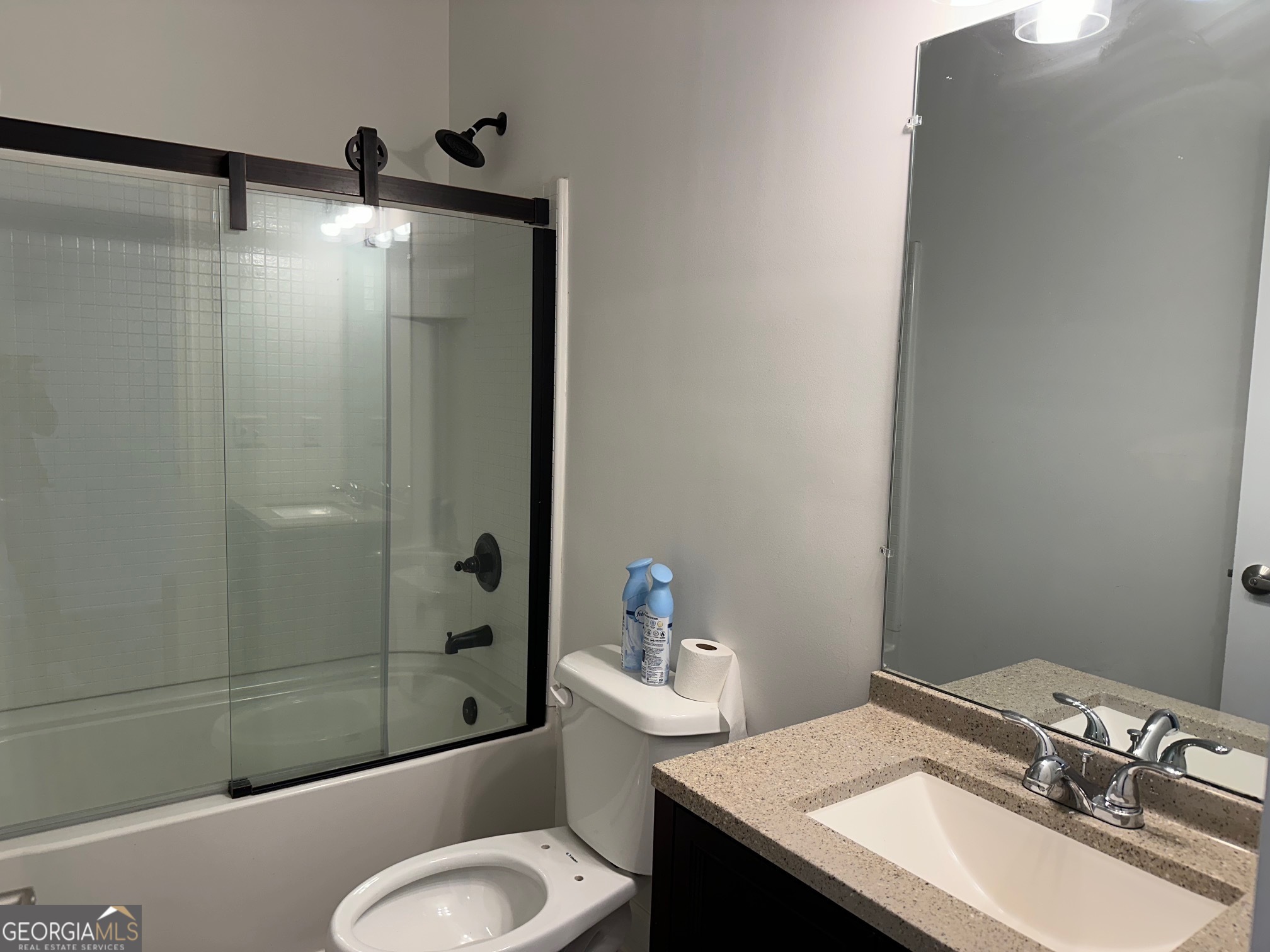 2147 Spring Road Gainesville, GA 30504 - Photo 24 of 44 a bathroom with a sink toilet and shower