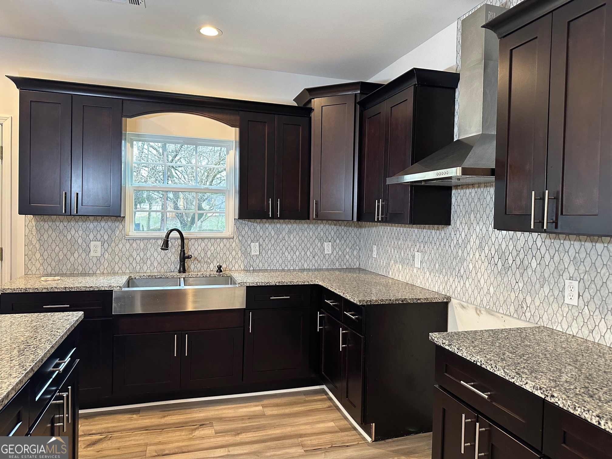 2147 Spring Road Gainesville, GA 30504 - Photo 28 of 44 a kitchen with a sink and a refrigerator