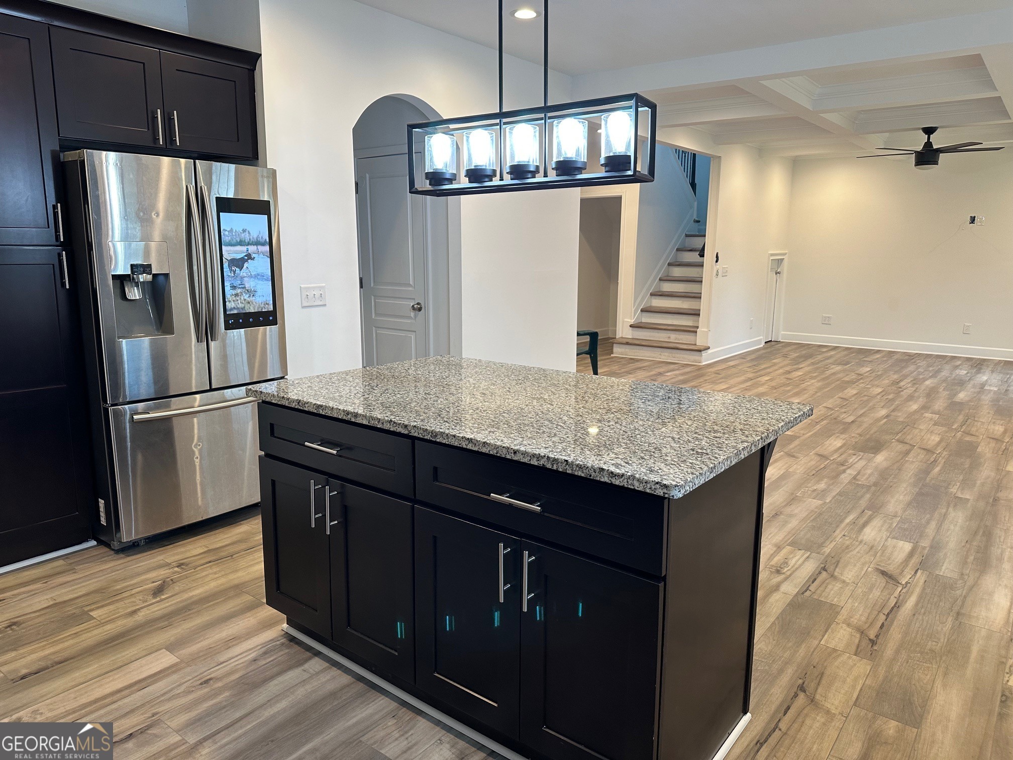 2147 Spring Road Gainesville, GA 30504 - Photo 30 of 44 a kitchen with granite countertop a refrigerator and a sink