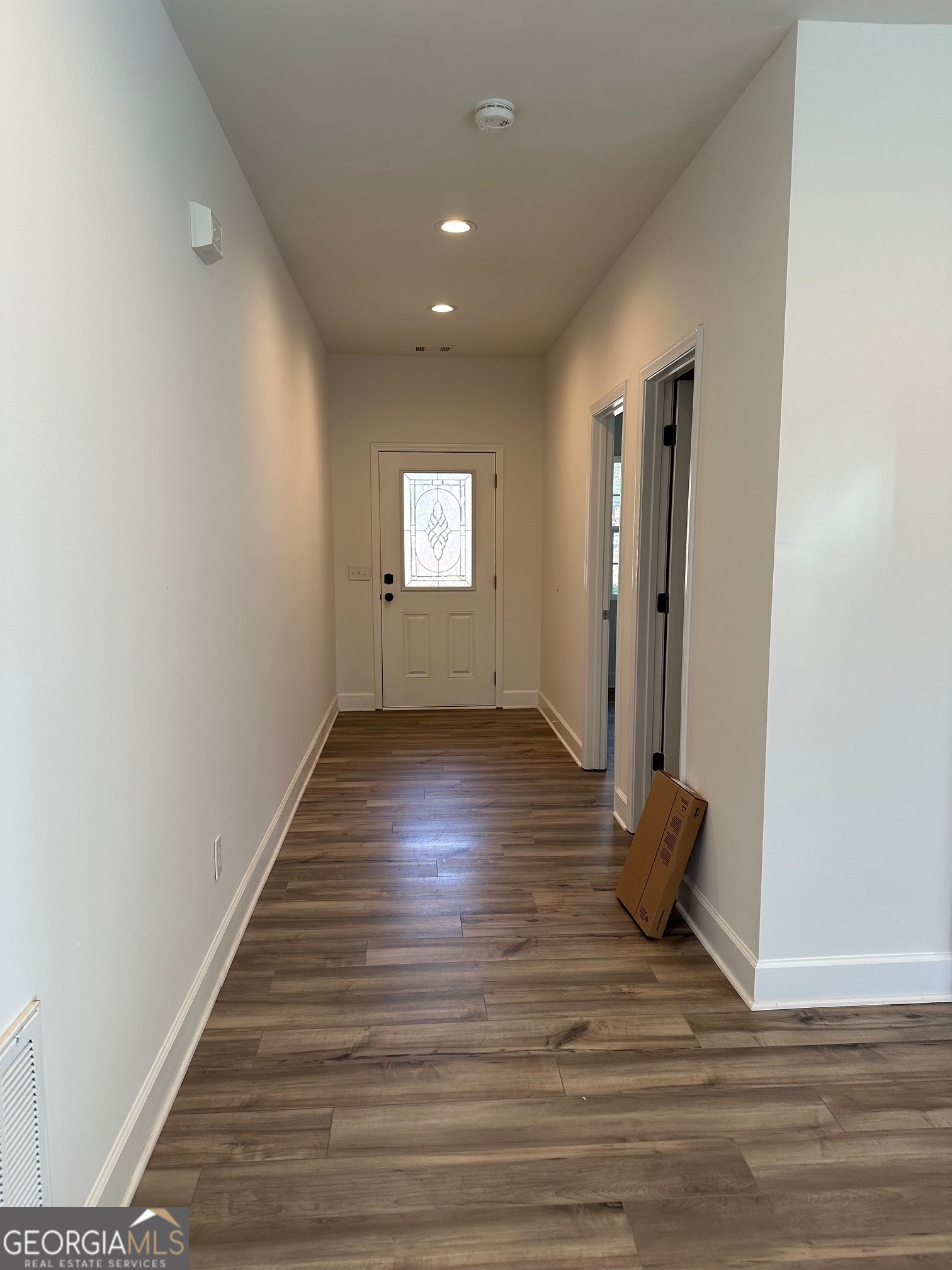 2147 Spring Road Gainesville, GA 30504 - Photo 3 of 44 a view of wooden floor and windows in a room