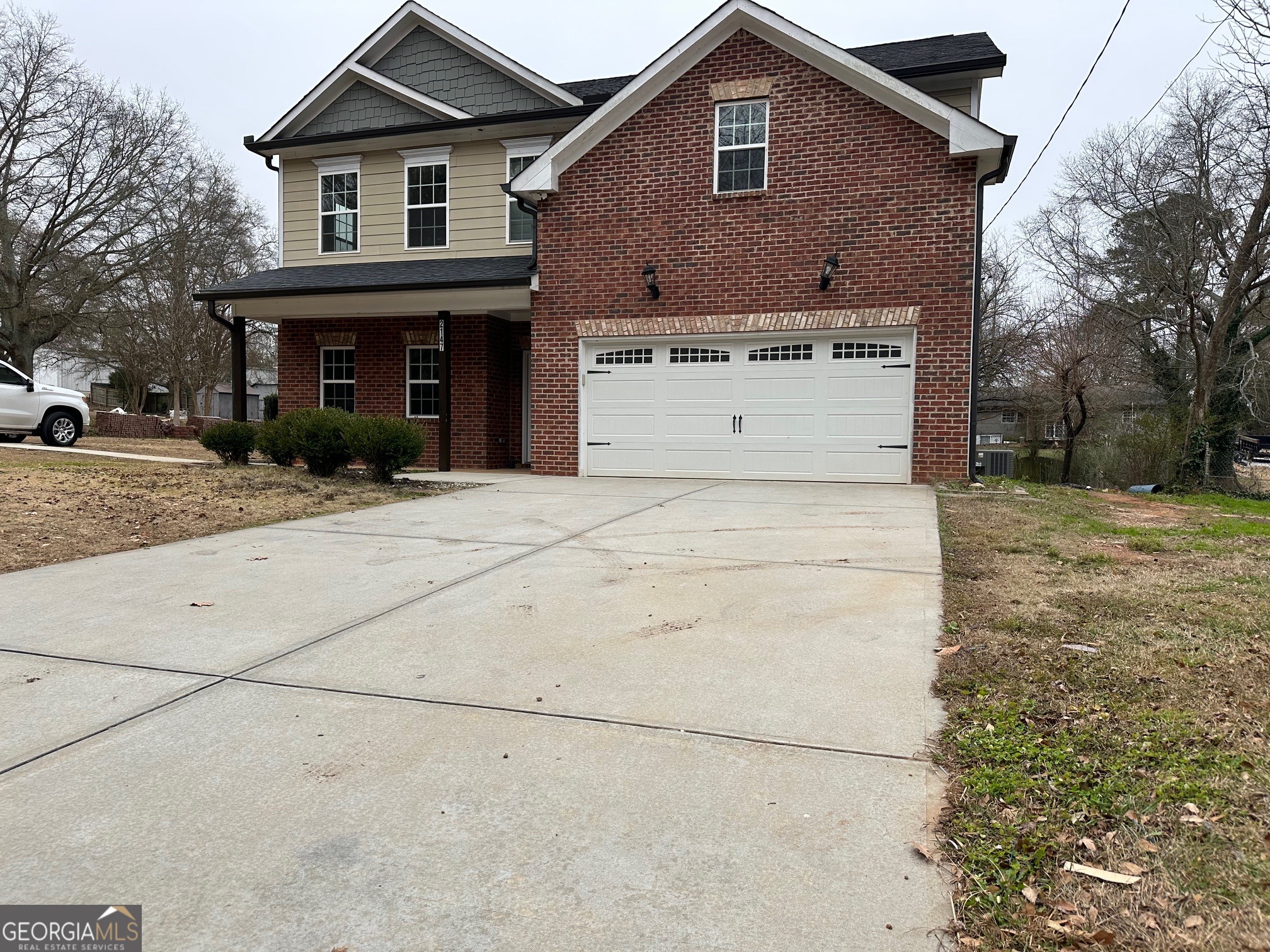 2147 Spring Road Gainesville, GA 30504 - Photo 43 of 44 a front view of a house with a yard