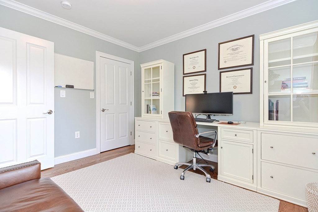 89 Walker Street, Unit 89 Newton, MA 02460 - Photo 24 of 42 a view of a workspace with furniture and a window