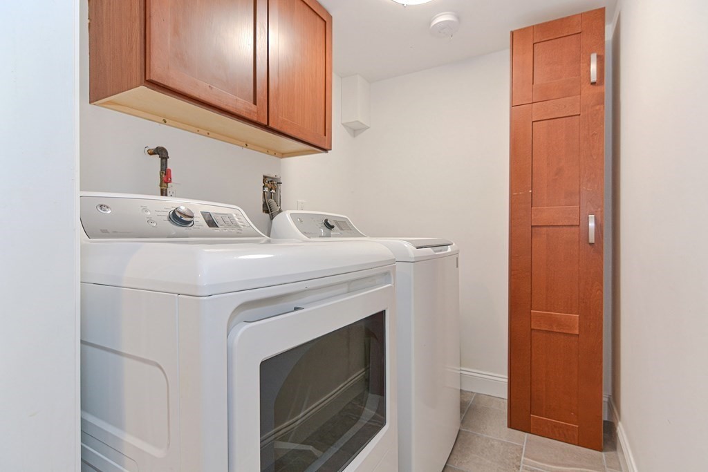 89 Walker Street, Unit 89 Newton, MA 02460 - Photo 34 of 42 a utility room with dryer and washer