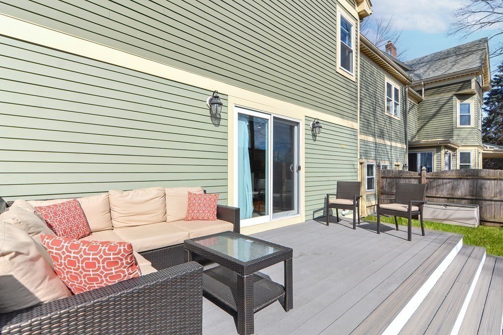 89 Walker Street, Unit 89 Newton, MA 02460 - Photo 35 of 42 a building outdoor space with patio furniture