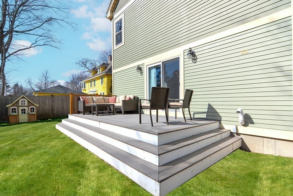 89 Walker Street, Unit 89 Newton, MA 02460 - Photo 36 of 42 a view of backyard with deck
