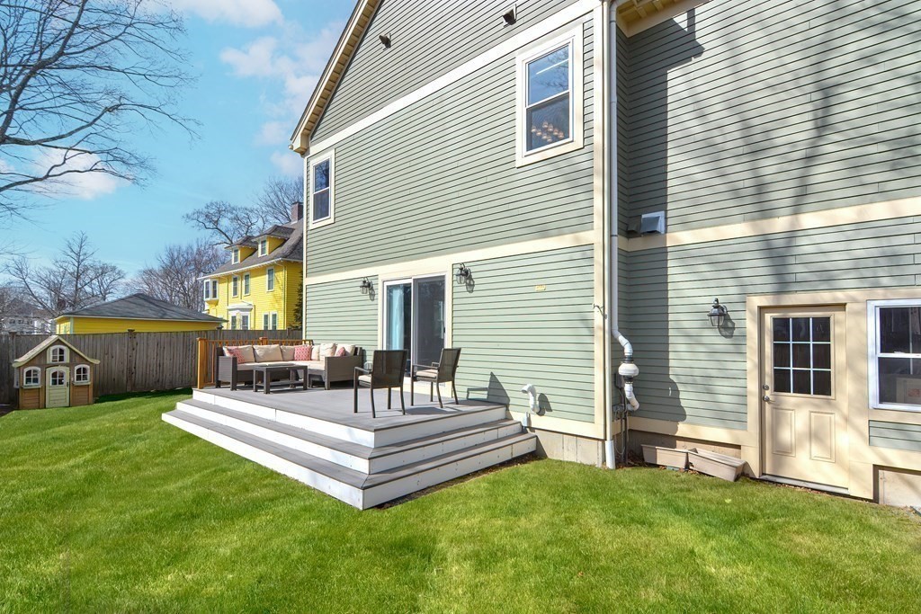 89 Walker Street, Unit 89 Newton, MA 02460 - Photo 38 of 42 a view of a house with a backyard