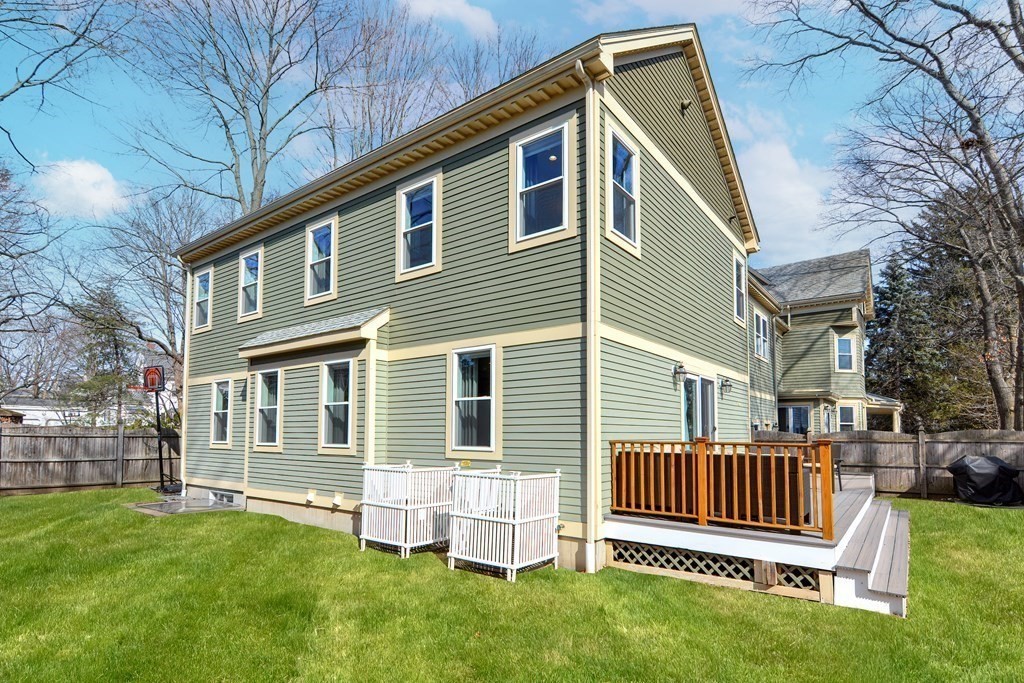 89 Walker Street, Unit 89 Newton, MA 02460 - Photo 40 of 42 a front view of a house with a garden