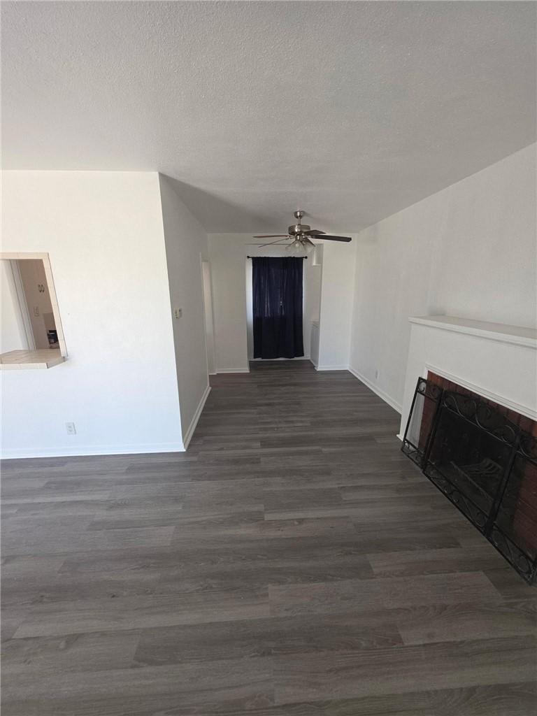512 E Street Needles, CA 92363 - Photo 4 of 20 a view of empty room with wooden floor