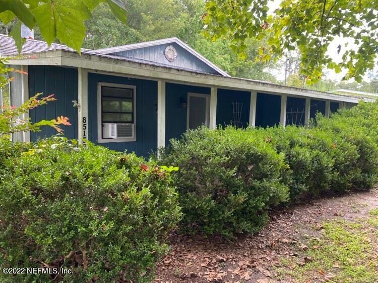 85152 Myrtice Road Yulee, FL 32097 - Photo 2 of 7 a view of front of a house with a yard