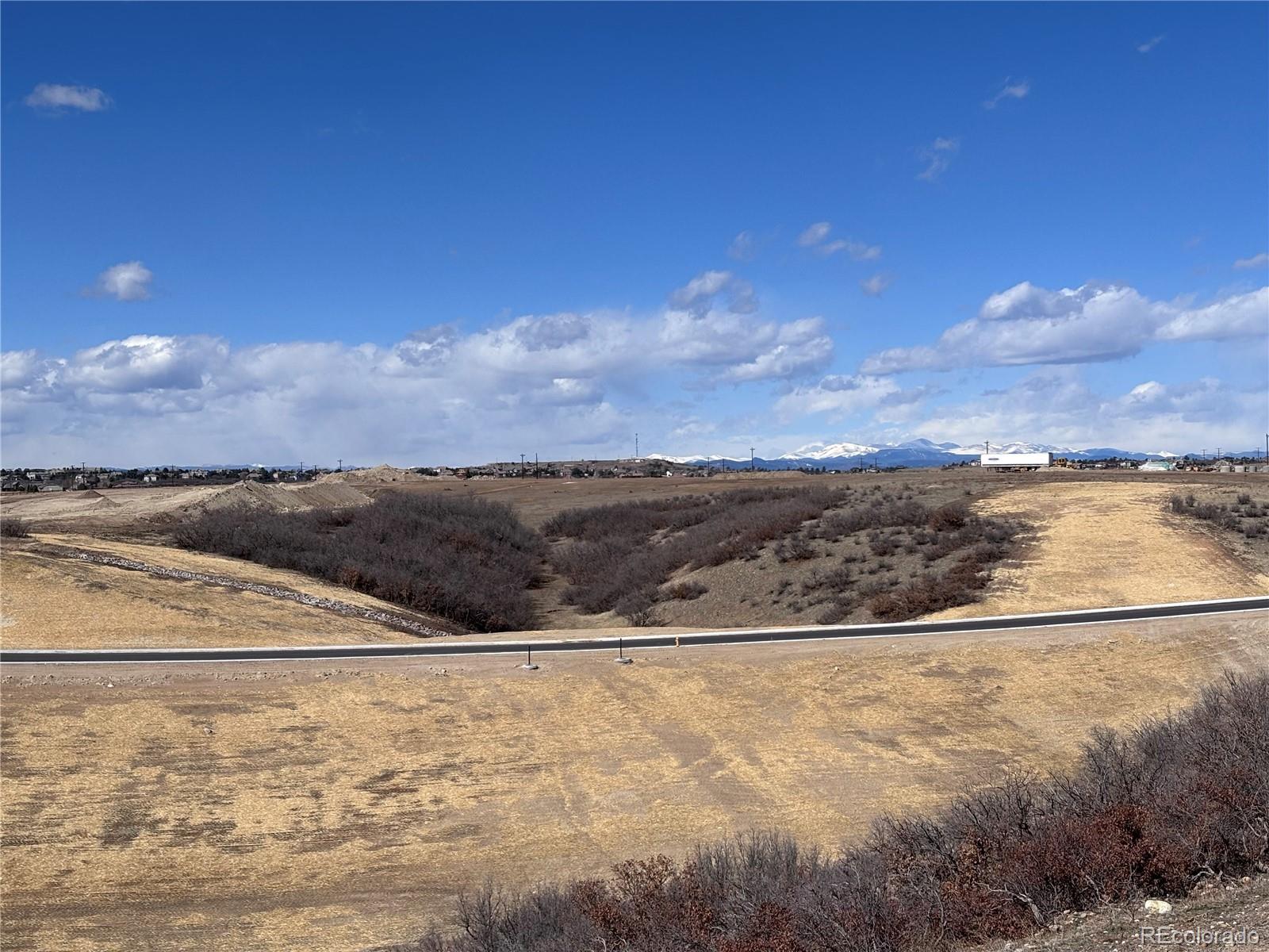 4261 Ridgewalk Point Castle Rock, CO 80108 - Photo 2 of 39 a view of an ocean and mountain
