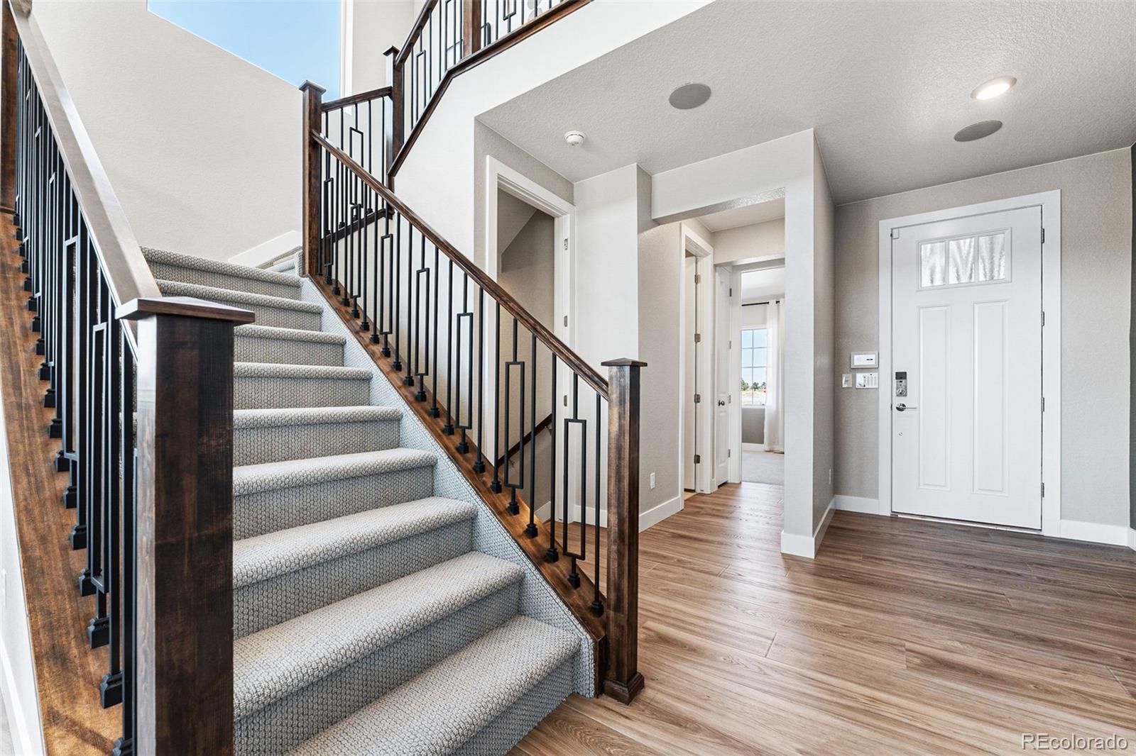 4261 Ridgewalk Point Castle Rock, CO 80108 - Photo 10 of 39 a view of an entryway with wooden floor