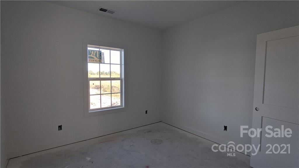 2105 State Rd S-46-1474, Unit 1 Clover, SC 29710 - Photo 13 of 31 a view of a window in an empty room