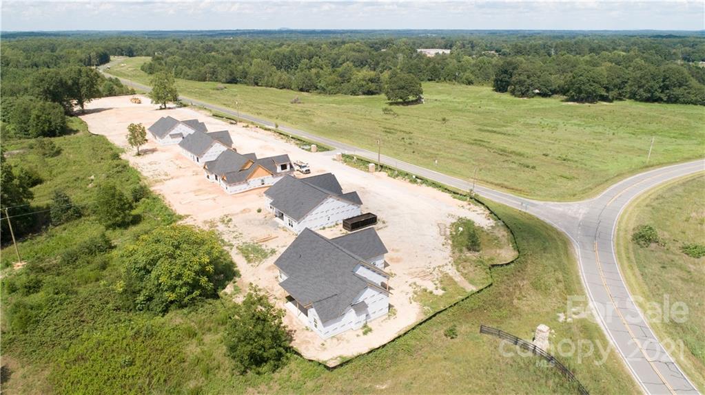 2105 State Rd S-46-1474, Unit 1 Clover, SC 29710 - Photo 24 of 31 a view of a lake with a yard