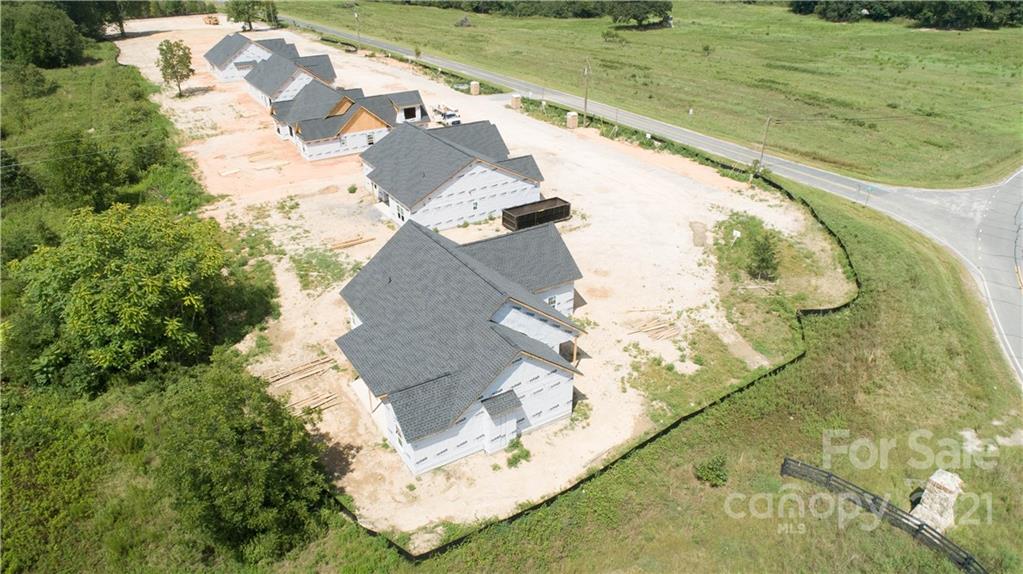 2105 State Rd S-46-1474, Unit 1 Clover, SC 29710 - Photo 27 of 31 an aerial view of residential houses with outdoor space
