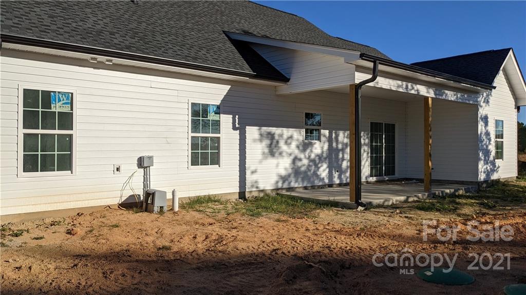 2105 State Rd S-46-1474, Unit 1 Clover, SC 29710 - Photo 4 of 31 a front view of a house with garden