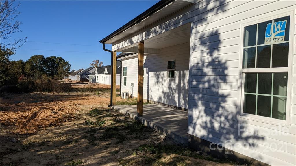 2105 State Rd S-46-1474, Unit 1 Clover, SC 29710 - Photo 5 of 31 a view of a house with a yard