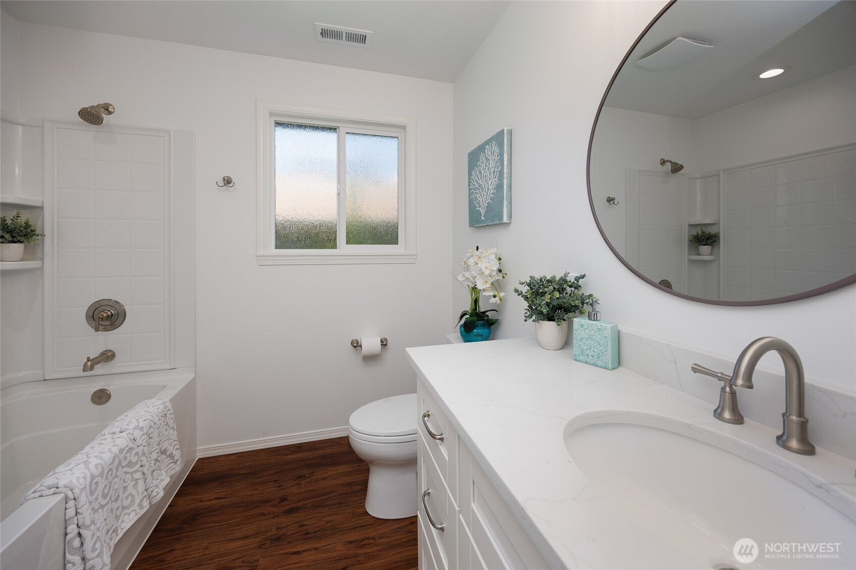 1708 Walnut Street Everett, WA 98201 - Photo 12 of 32 a bathroom with a granite countertop sink a toilet and a mirror