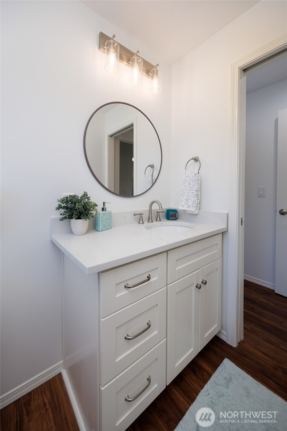 1708 Walnut Street Everett, WA 98201 - Photo 14 of 32 a bathroom with a granite countertop sink and a mirror