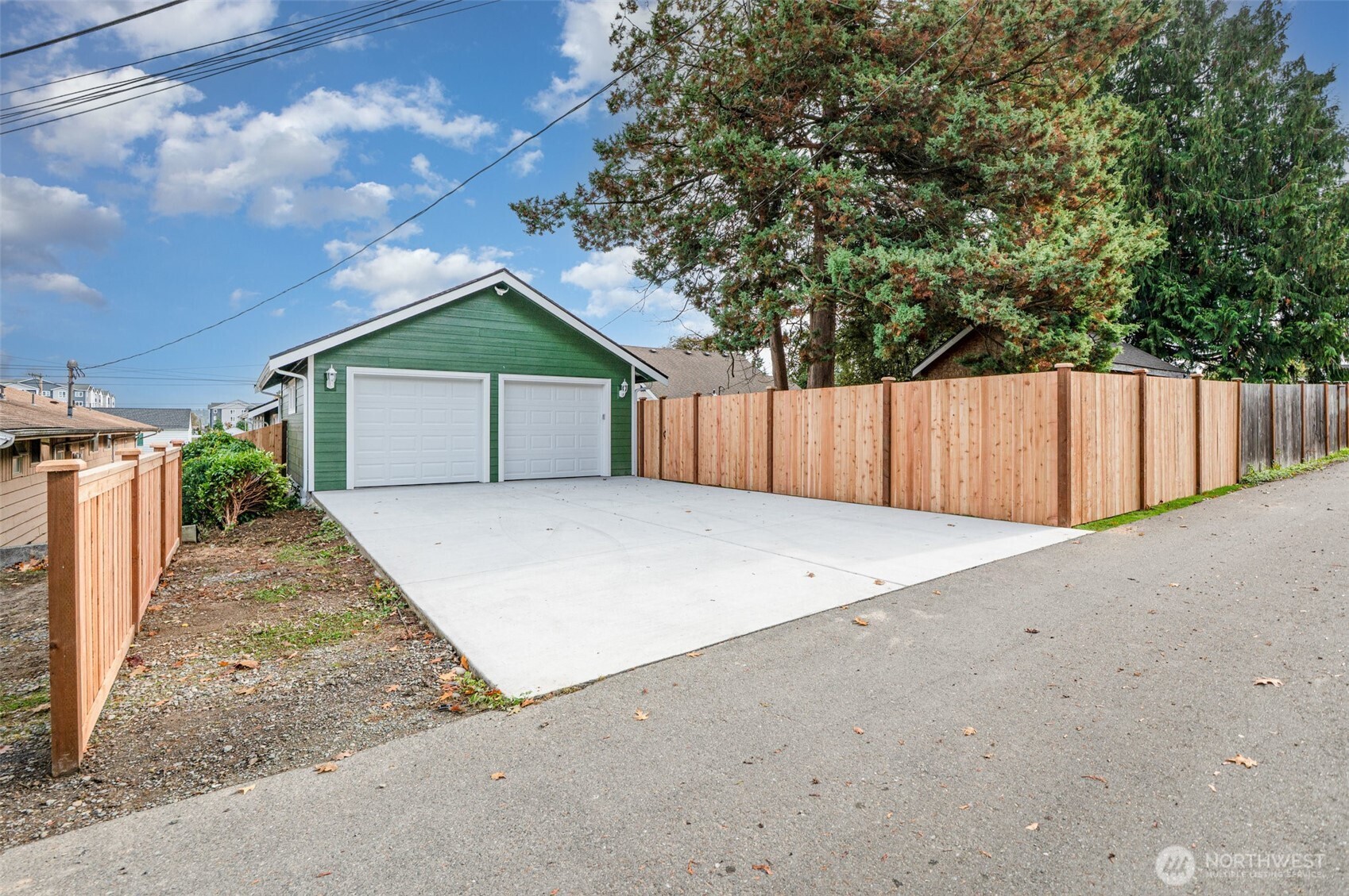 1708 Walnut Street Everett, WA 98201 - Photo 17 of 32 a house with a tree in front of it