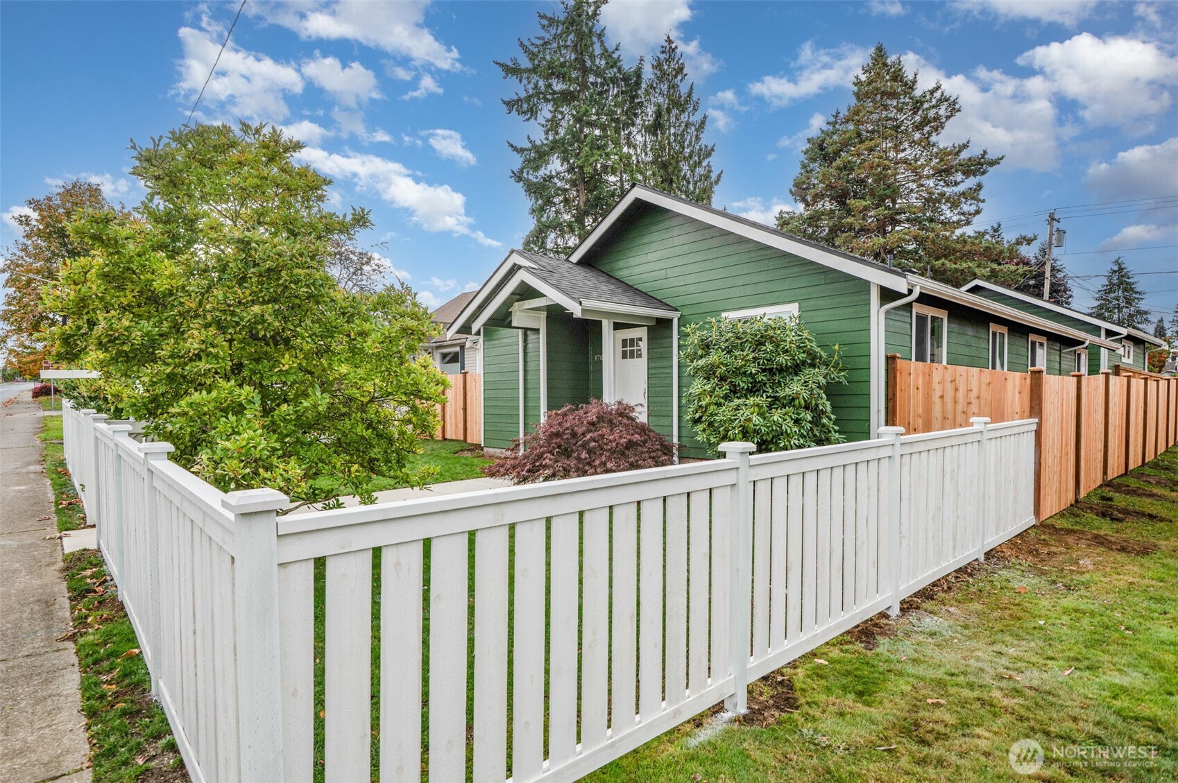1708 Walnut Street Everett, WA 98201 - Photo 26 of 32 a view of a house with wooden fence