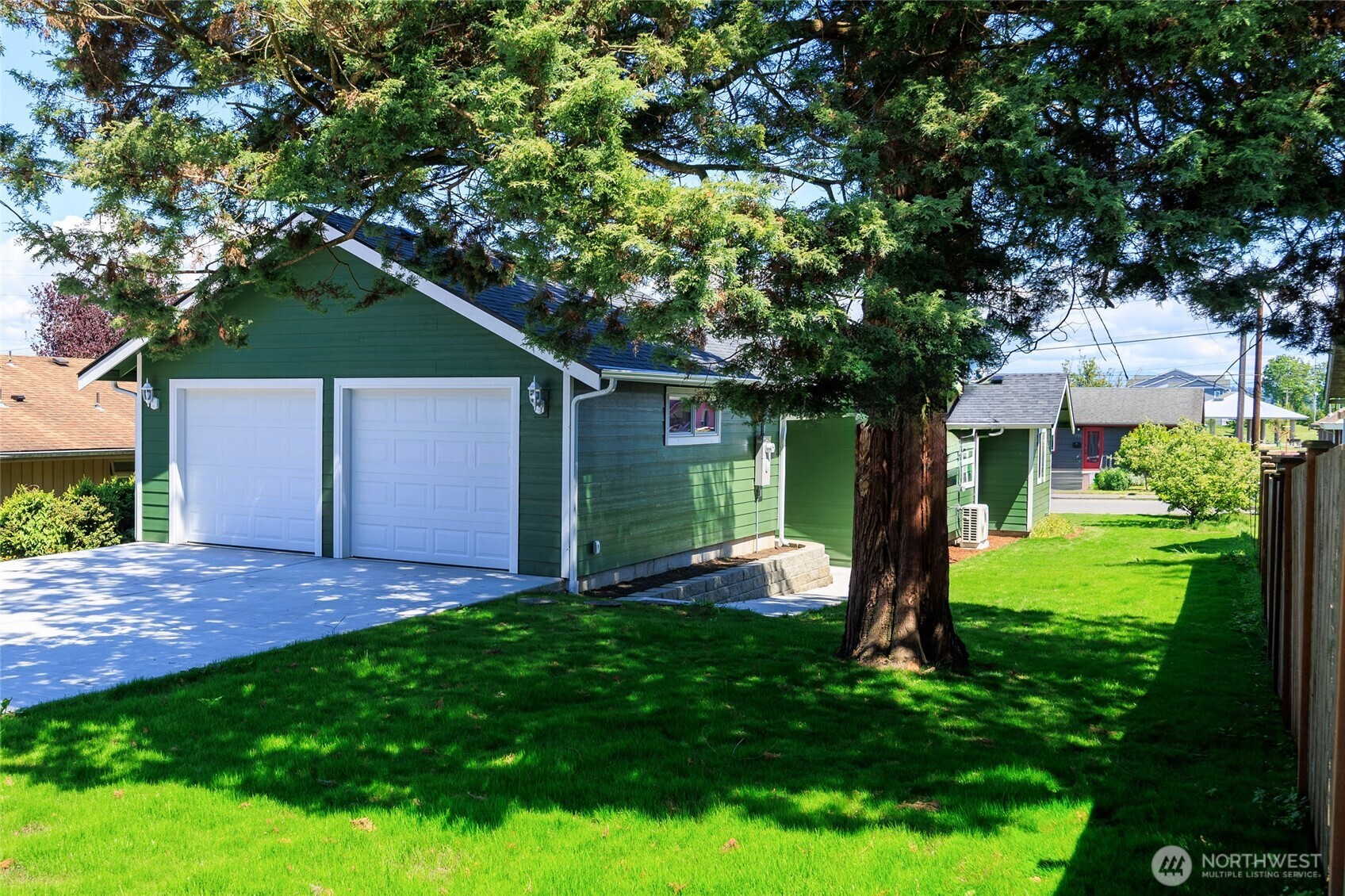 1708 Walnut Street Everett, WA 98201 - Photo 6 of 32 a view of a house with a backyard