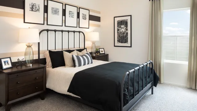 a bedroom with a bed and window