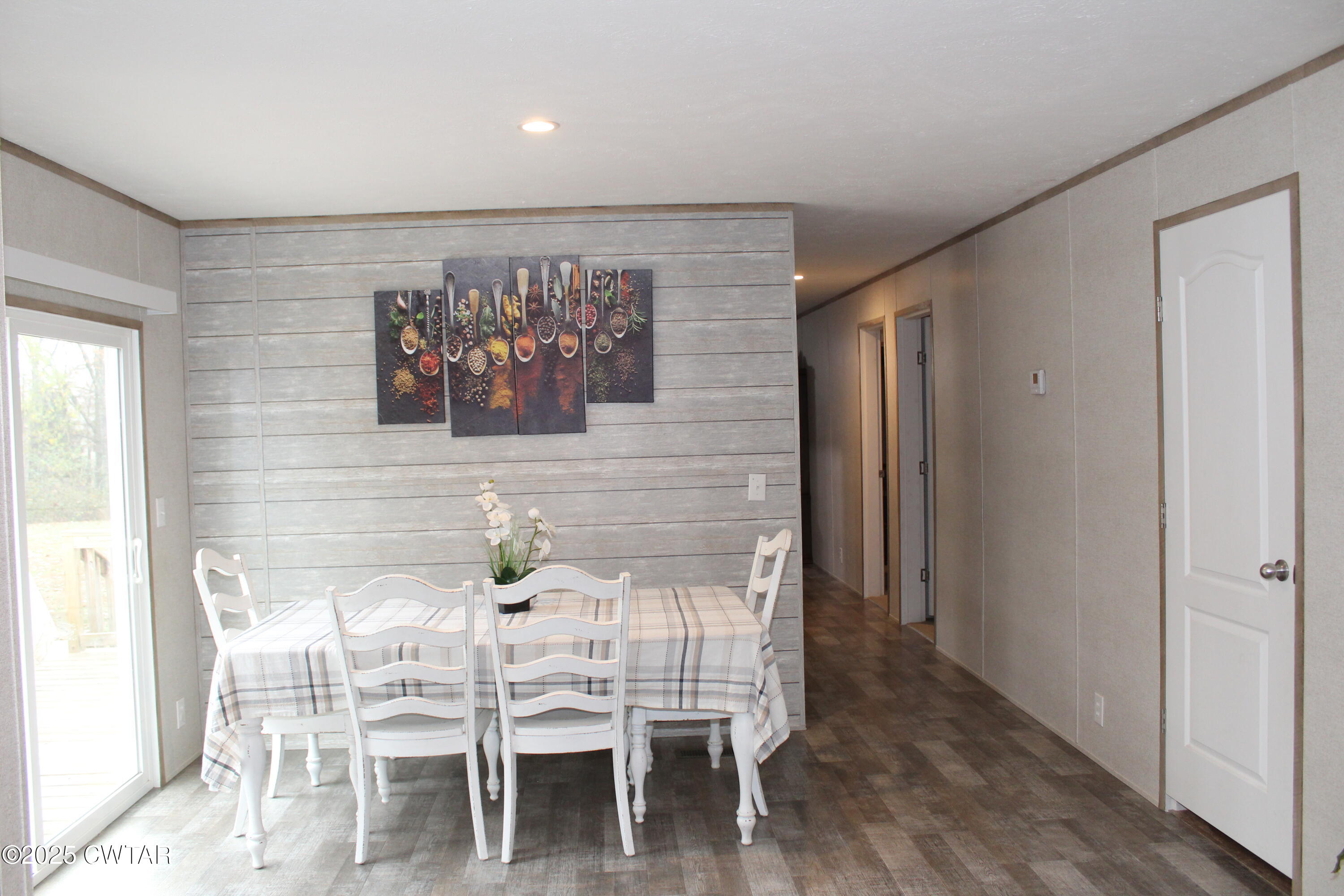 34 Rubin White Road Bradford, TN 38316 - Photo 12 of 35 a dining room with furniture and wooden floor
