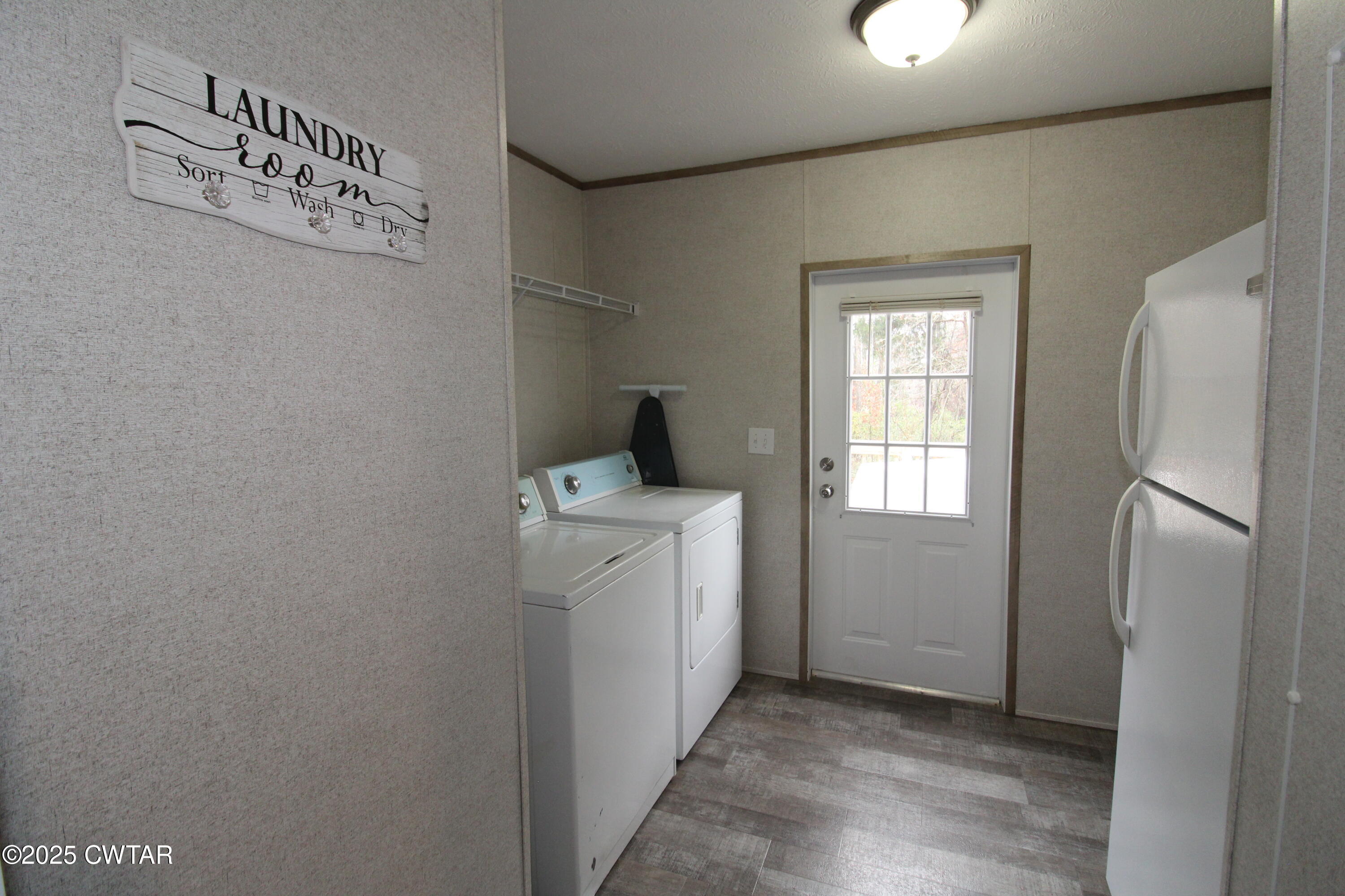 34 Rubin White Road Bradford, TN 38316 - Photo 18 of 35 a utility room with dryer and washer