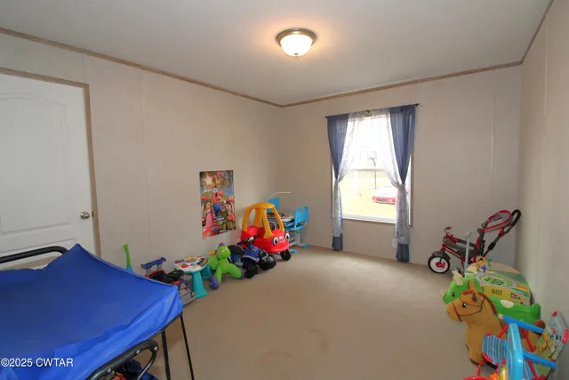 a room with furniture and a window