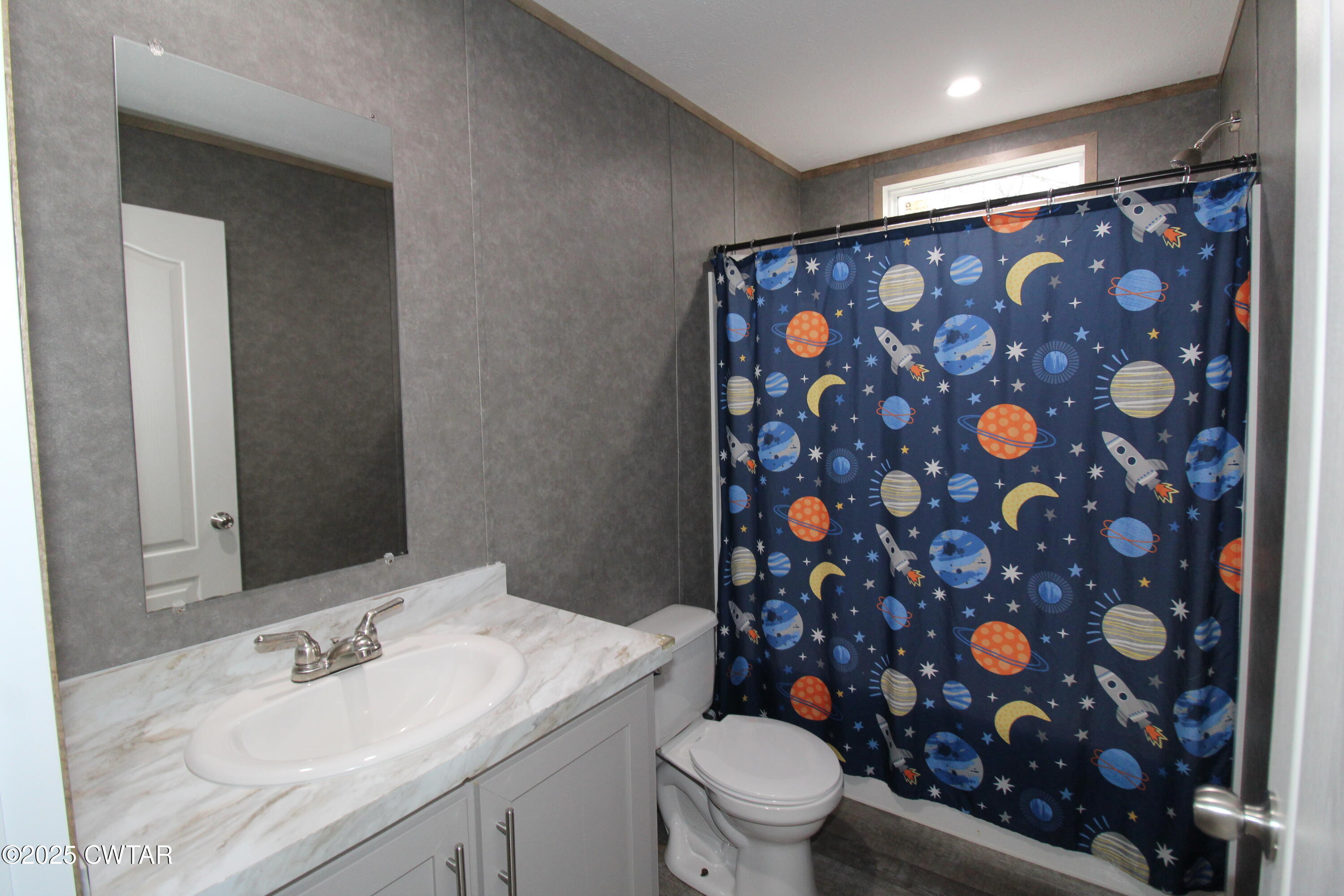 34 Rubin White Road Bradford, TN 38316 - Photo 31 of 35 a bathroom with a sink toilet and shower