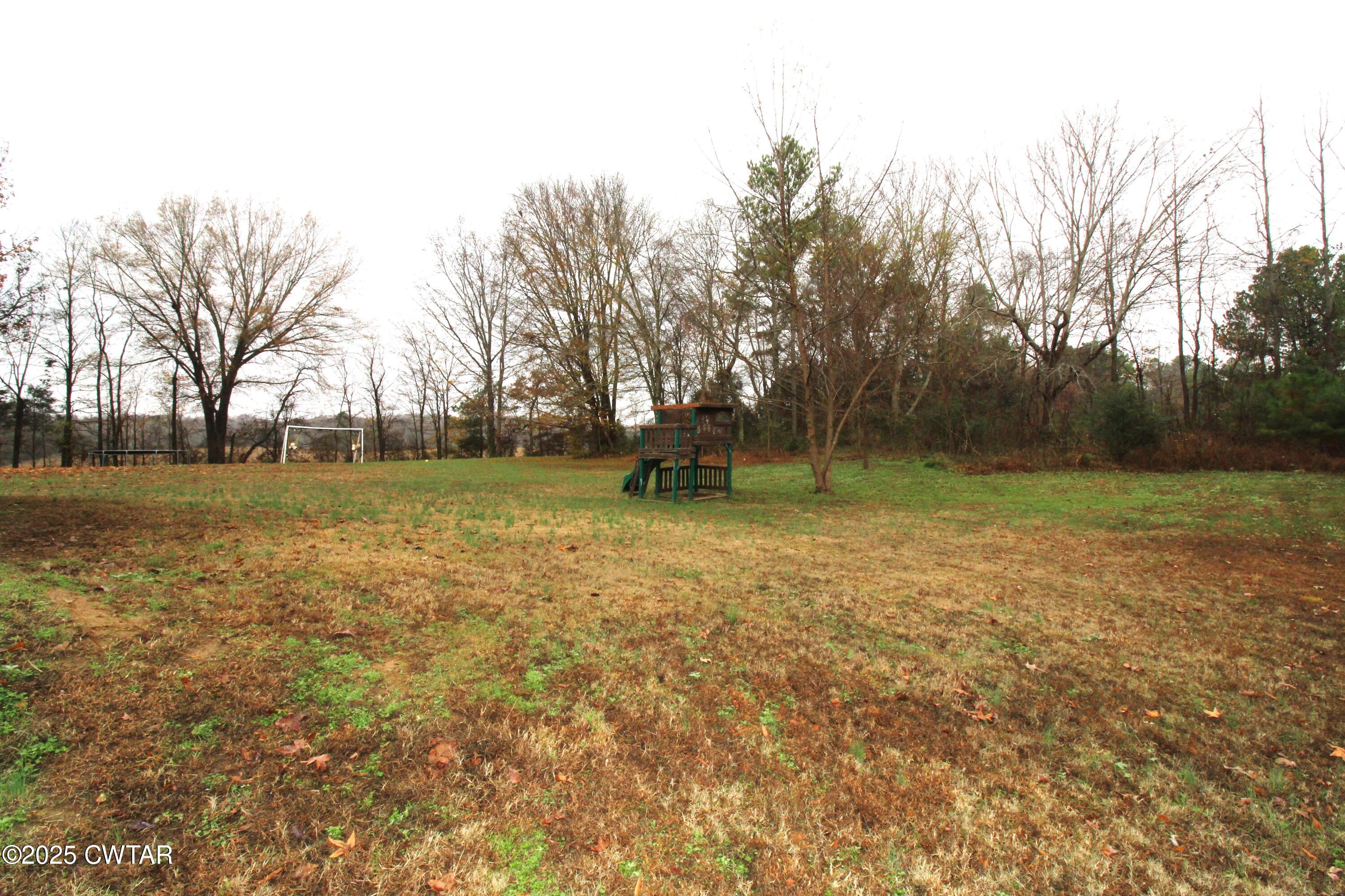 34 Rubin White Road Bradford, TN 38316 - Photo 35 of 35 a view of outdoor space with deck and yard