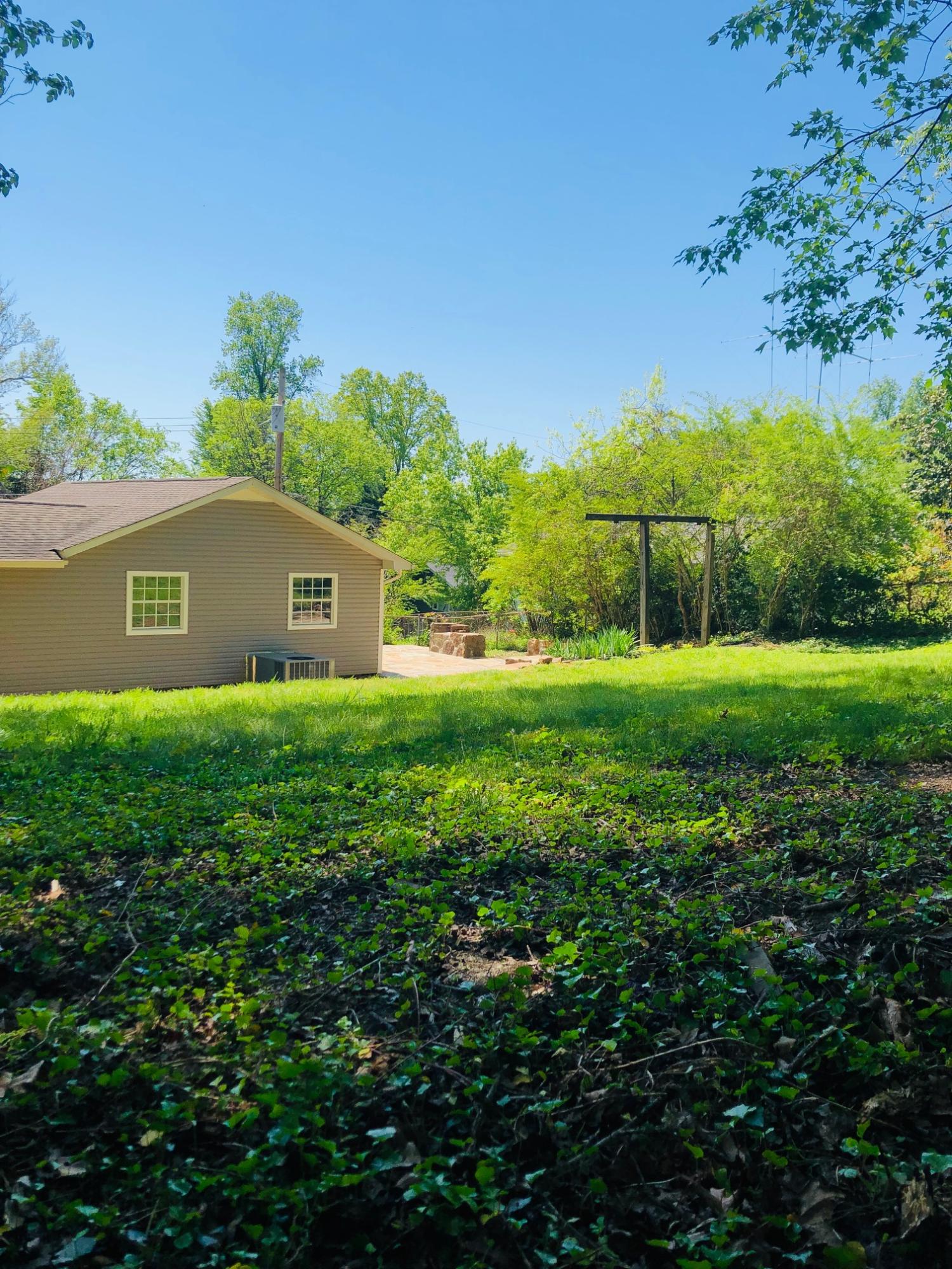305 East Faunce Lane Oak Ridge, TN 37830 - Photo 8 of 38 Back Yard Facing down