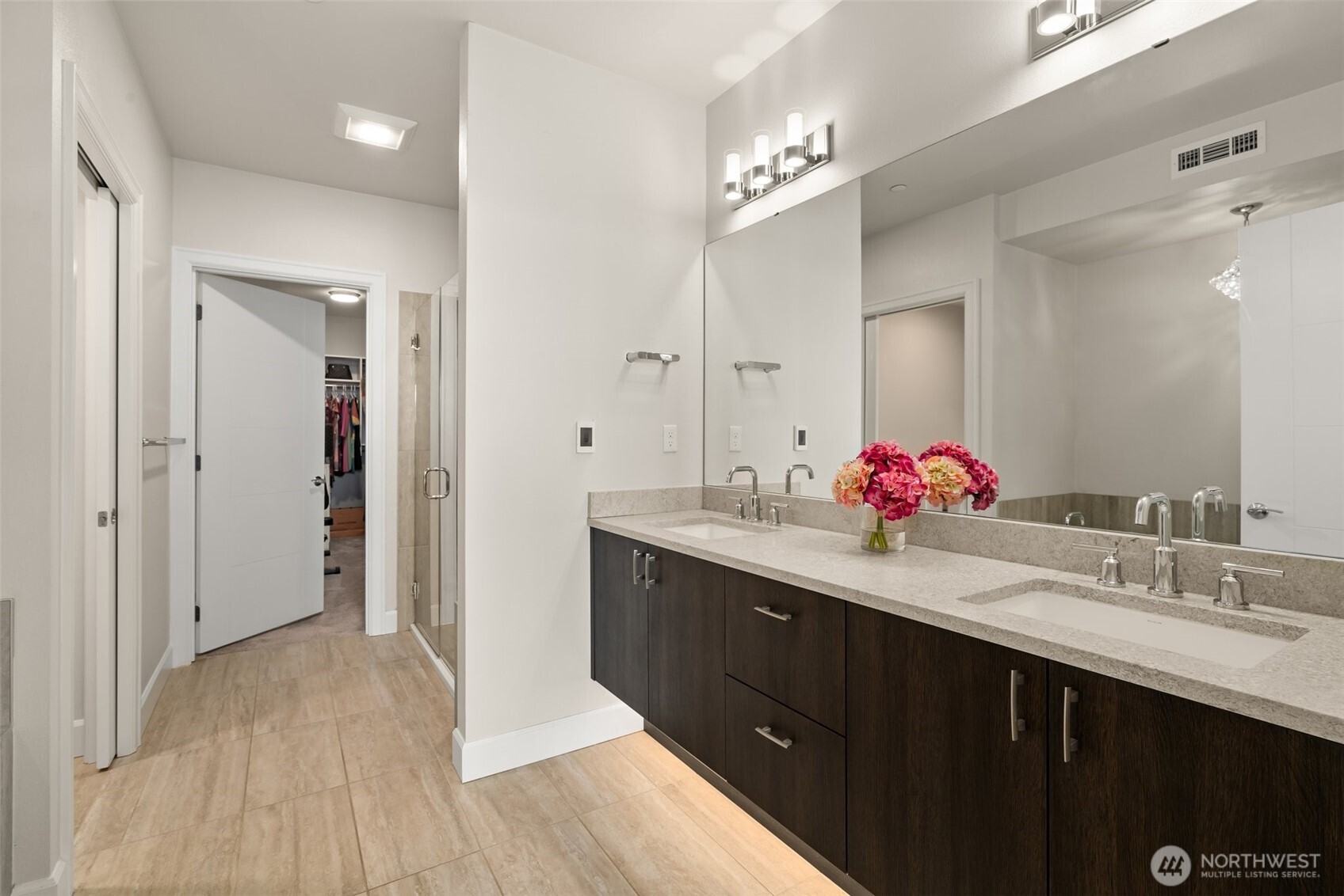 4961 Main Street, Unit 802 Tacoma, WA 98407 - Photo 19 of 39 a bathroom with a sink vanity and a mirror