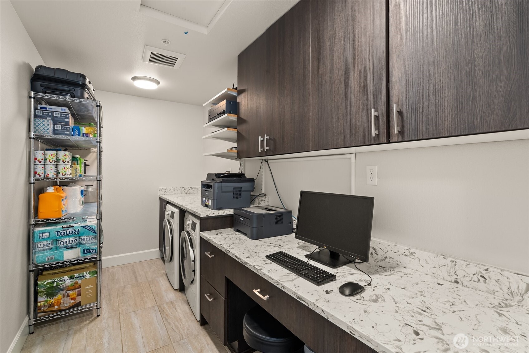 4961 Main Street, Unit 802 Tacoma, WA 98407 - Photo 26 of 39 a workspace with furniture and wooden floor