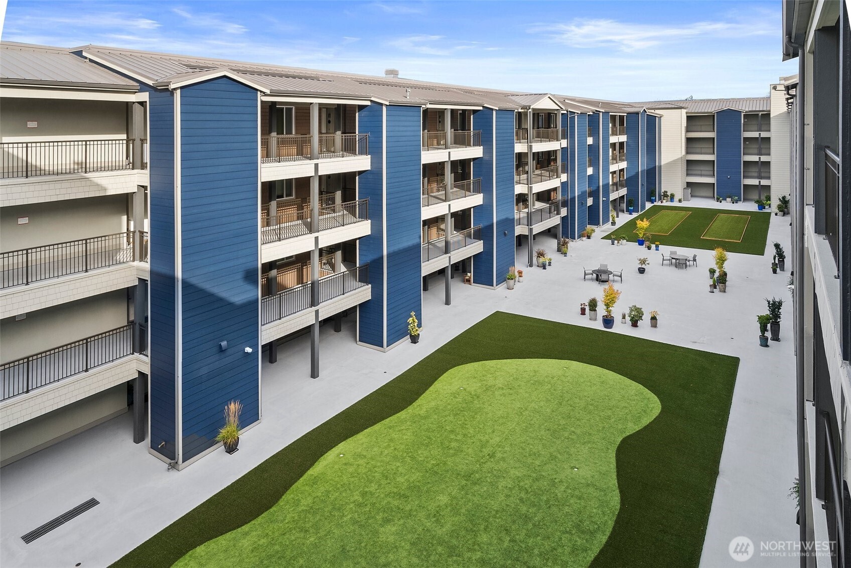 4961 Main Street, Unit 802 Tacoma, WA 98407 - Photo 34 of 39 a view of a living room and furniture