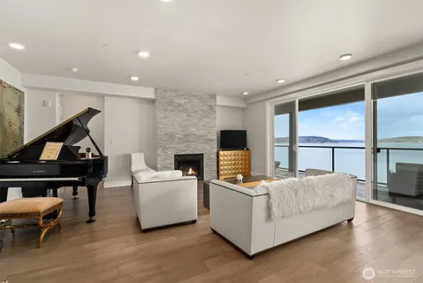 a bedroom with furniture and a fireplace