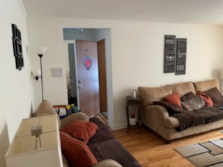 4264 West Nelson Street, Unit 2 Chicago, IL 60641 - Photo 2 of 7 a living room with furniture