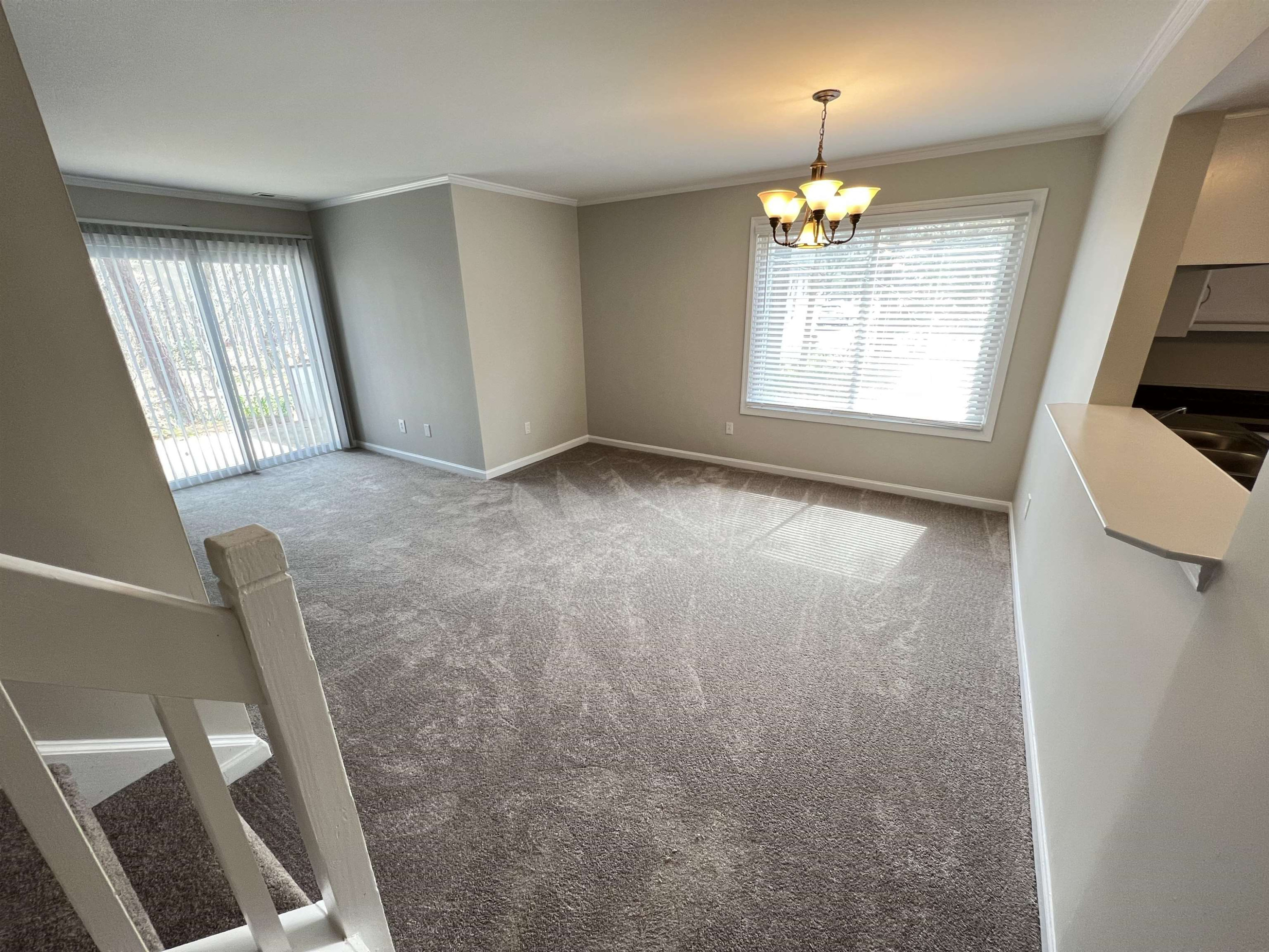 1227 Seaton Road, Unit 33 Durham, NC 27713 - Photo 13 of 21 a view of an empty room with a window