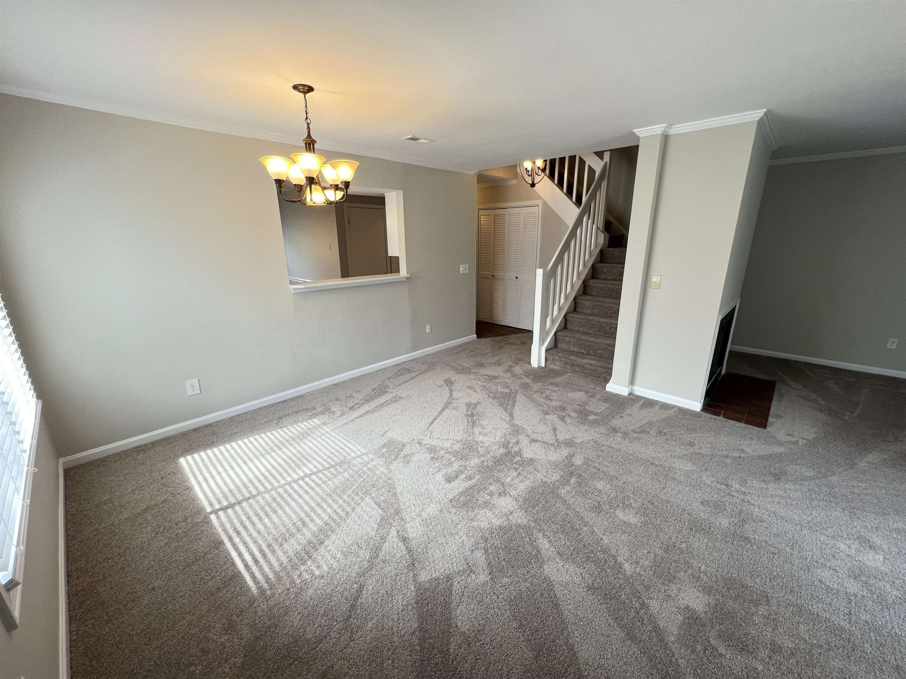 1227 Seaton Road, Unit 33 Durham, NC 27713 - Photo 14 of 21 a view of livingroom with hardwood floor and hallway