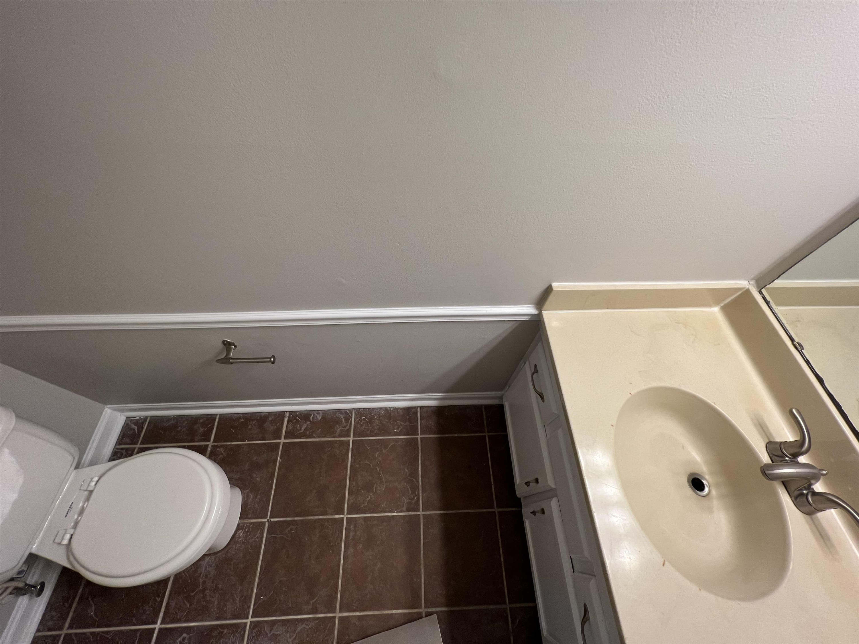 1227 Seaton Road, Unit 33 Durham, NC 27713 - Photo 17 of 21 a bathroom with a sink toilet and shower