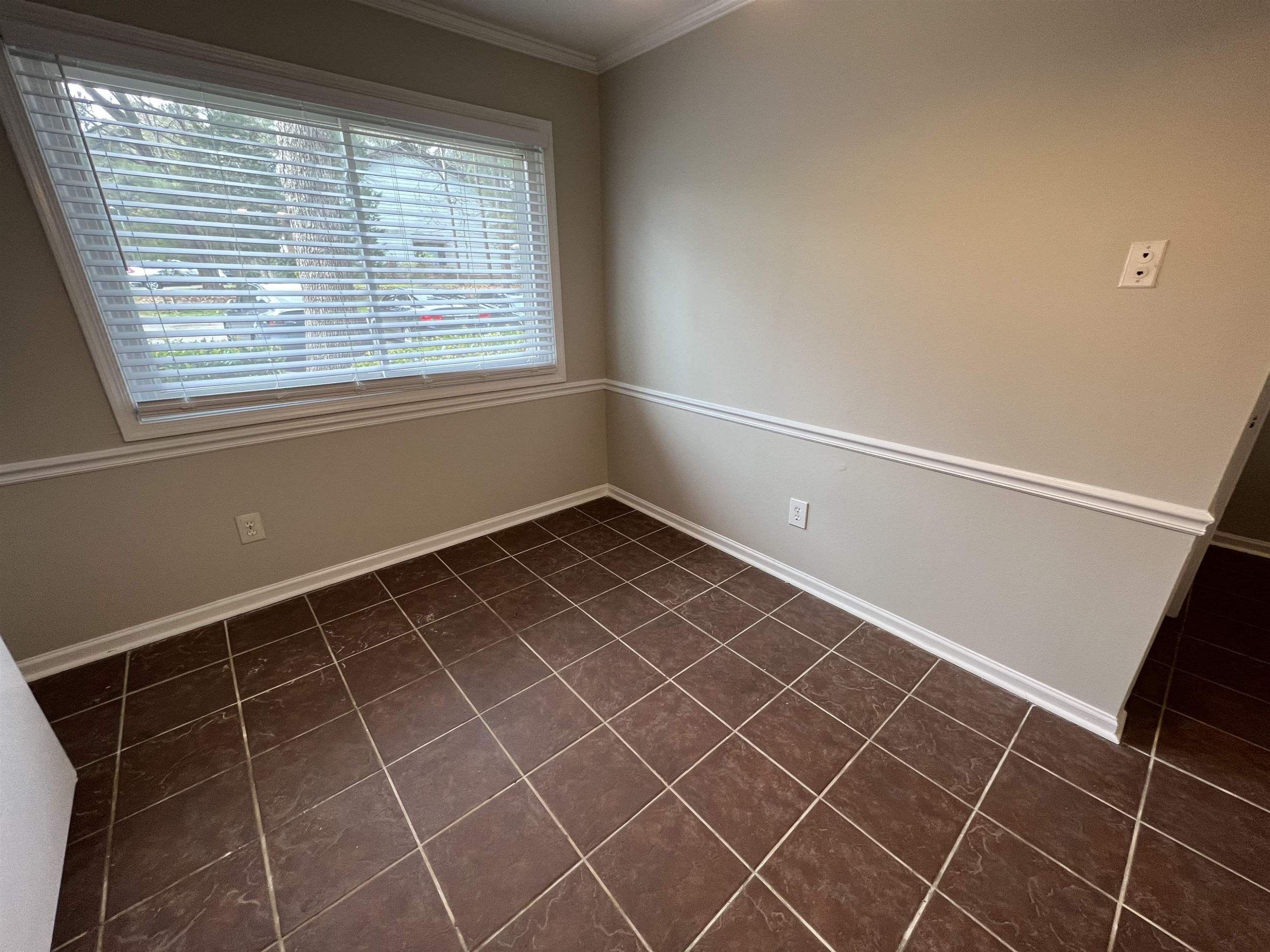 1227 Seaton Road, Unit 33 Durham, NC 27713 - Photo 21 of 21 a view of an empty room with a window