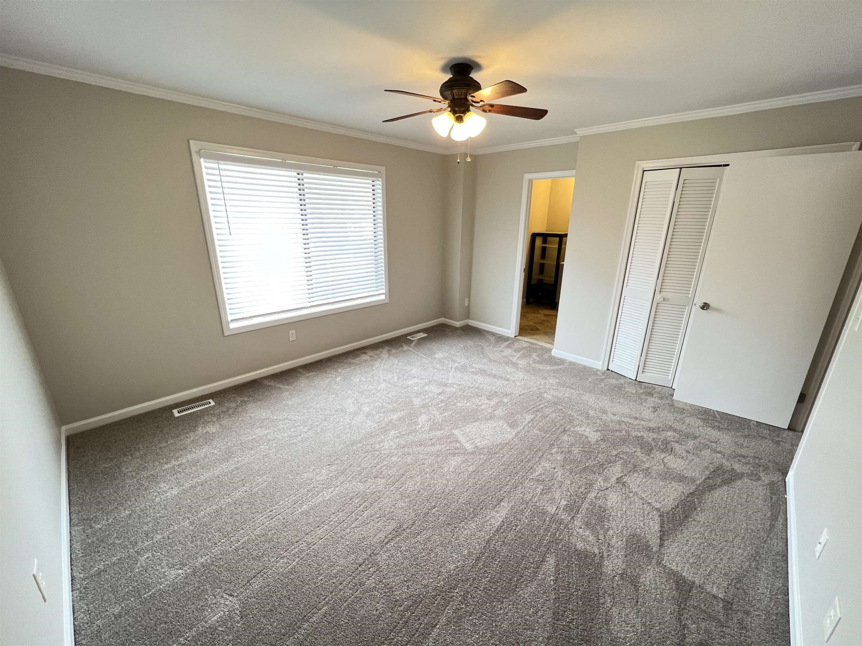 1227 Seaton Road, Unit 33 Durham, NC 27713 - Photo 9 of 21 a view of an empty room with a window
