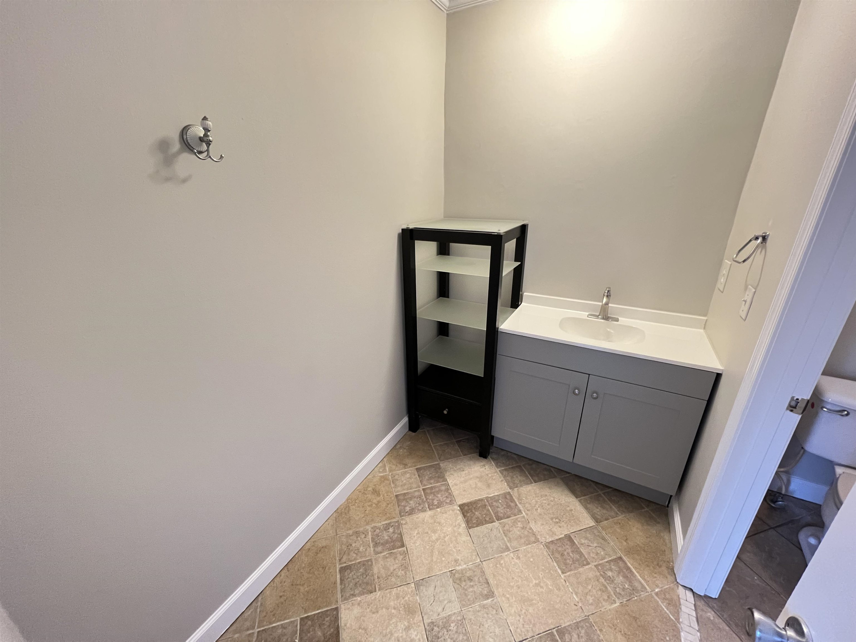 1227 Seaton Road, Unit 33 Durham, NC 27713 - Photo 10 of 21 a bathroom with a sink and a mirror
