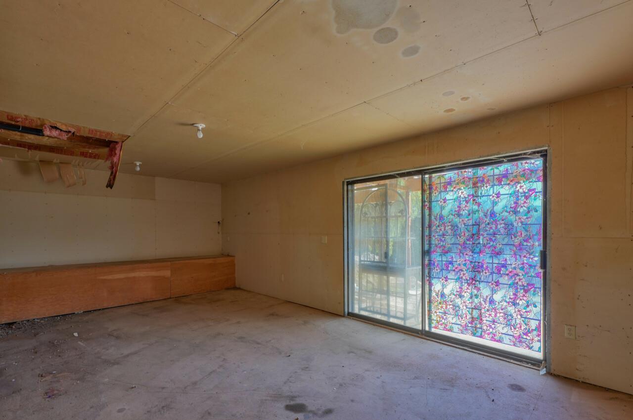 26045 Toro Road Salinas, CA 93908 - Photo 29 of 35 an empty room with sliding door