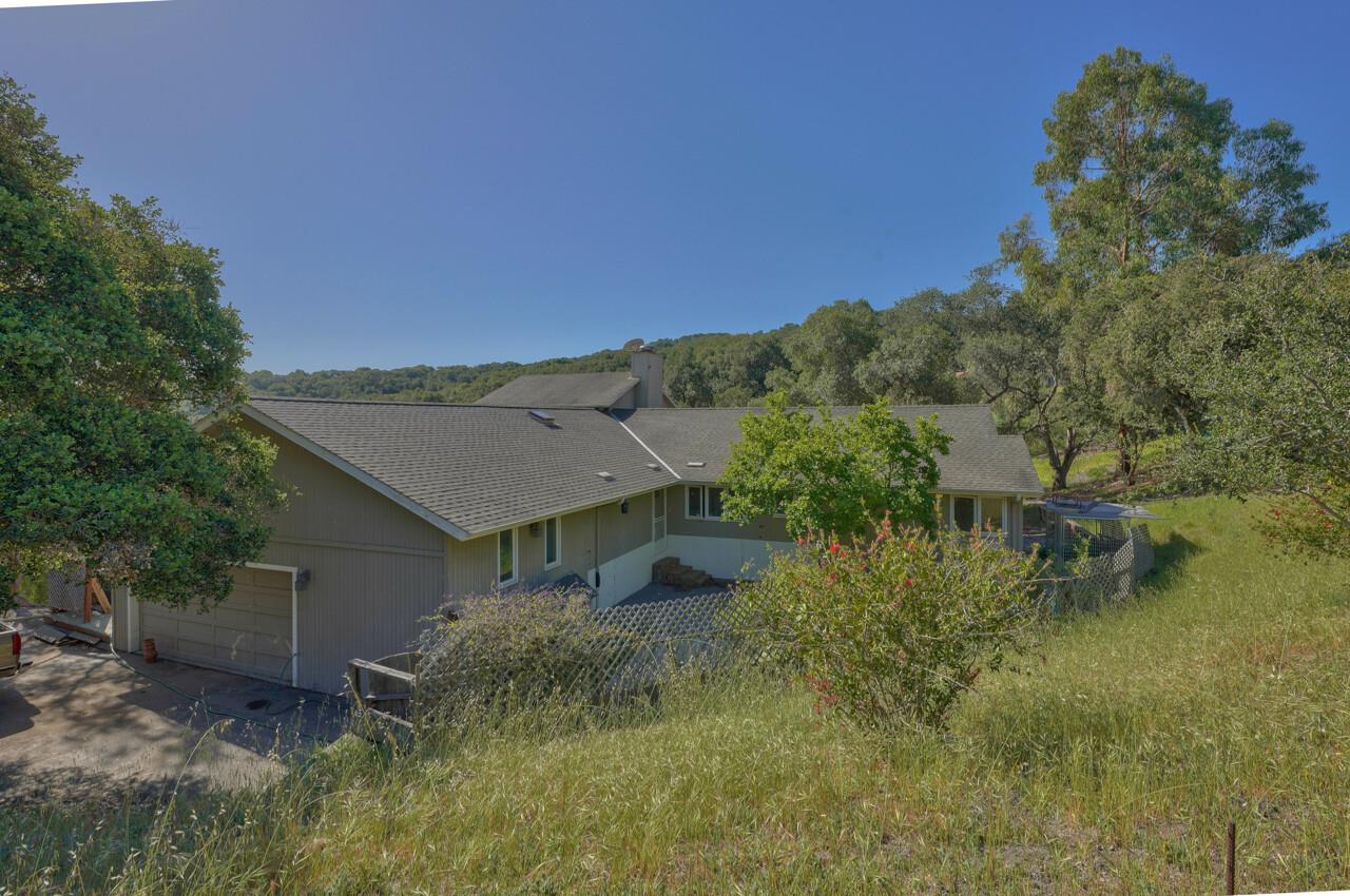 26045 Toro Road Salinas, CA 93908 - Photo 31 of 35 a view of a house with a yard