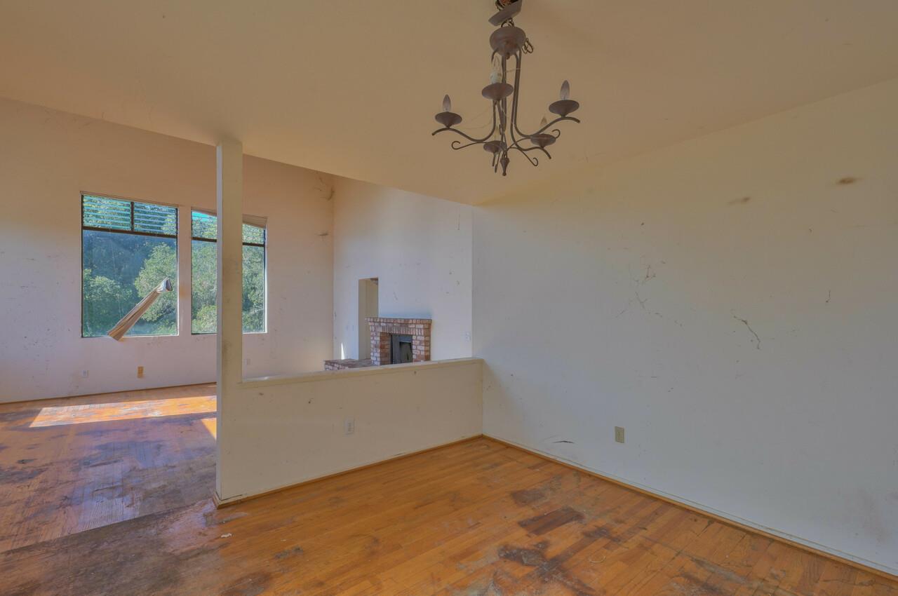 26045 Toro Road Salinas, CA 93908 - Photo 4 of 35 a view of a room with a ceiling fan and window