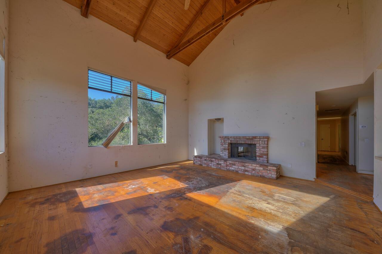 26045 Toro Road Salinas, CA 93908 - Photo 6 of 35 a view of empty room with a fireplace